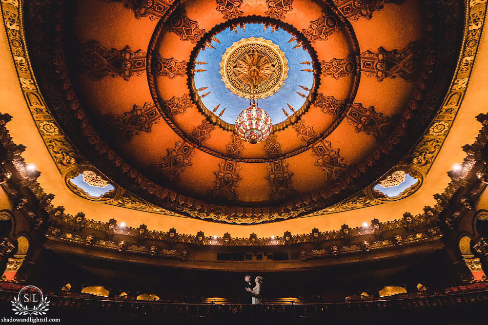 bride and groom on balcony at Fabulous Fox Theater St Louis wedding