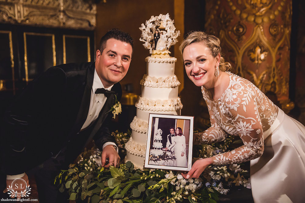 cake cutting at Fabulous Fox Theater St Louis wedding