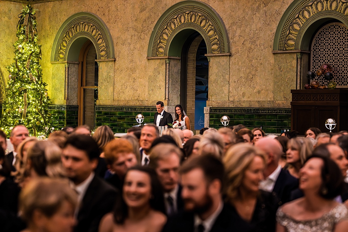 Bride and father coming down in beautiful St. Louis Union Station wedding photo