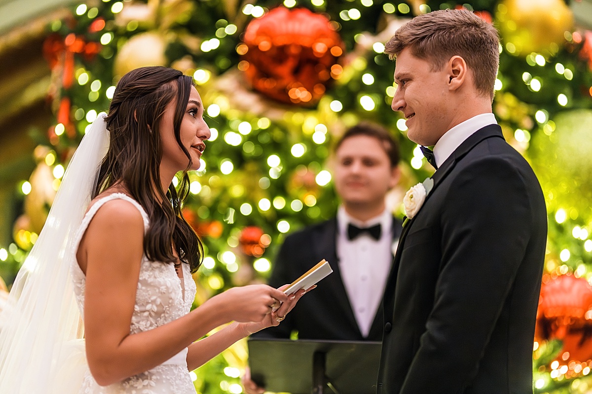 bride and groom exchanging vows in beautiful St. Louis Union Station wedding photo