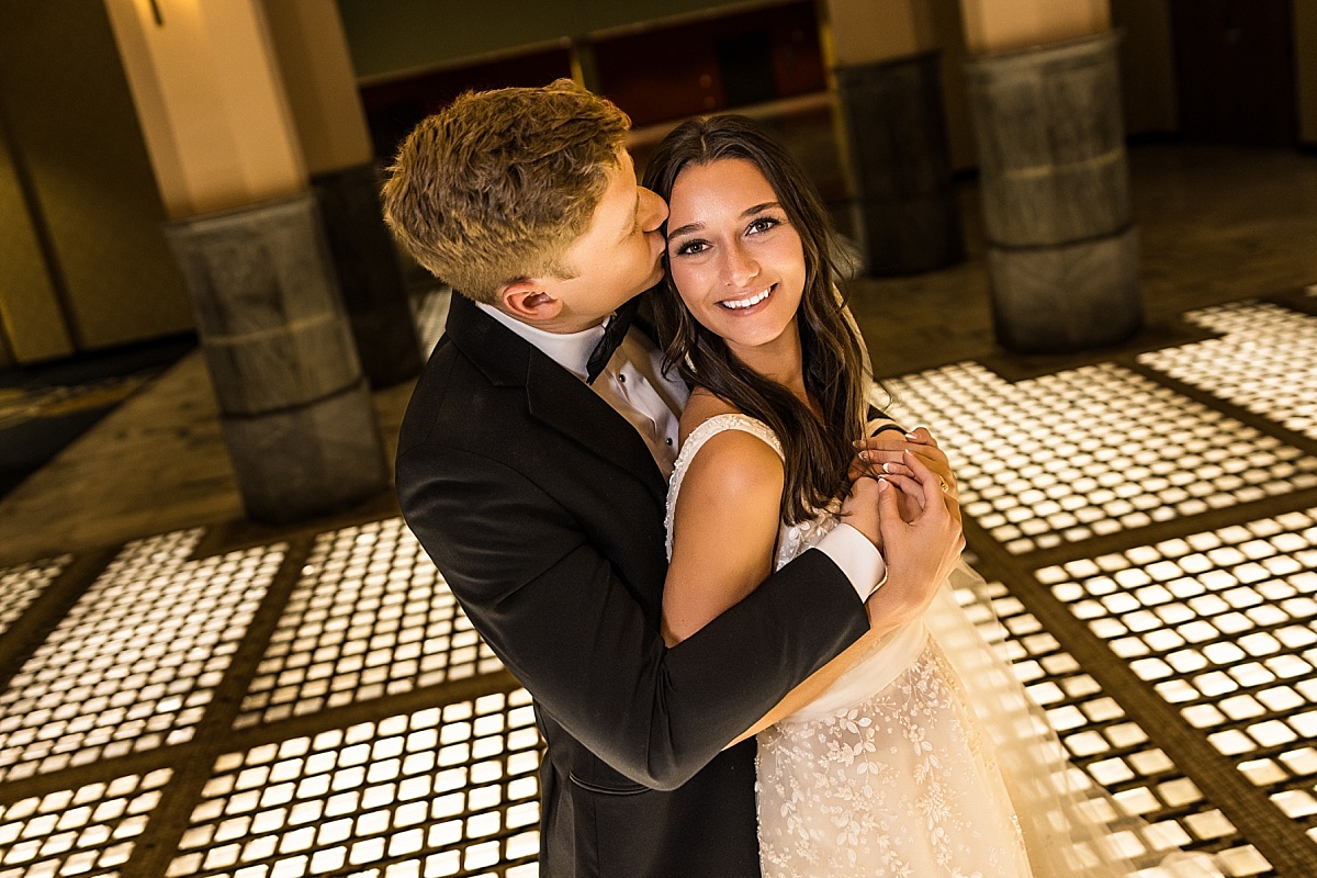 bride and groom on light floor in beautiful St. Louis Union Station wedding photo