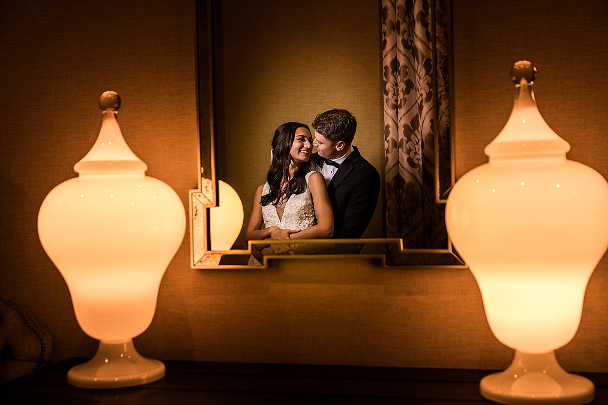 cool reflection photo of bride and groom in beautiful St. Louis Union Station wedding photo