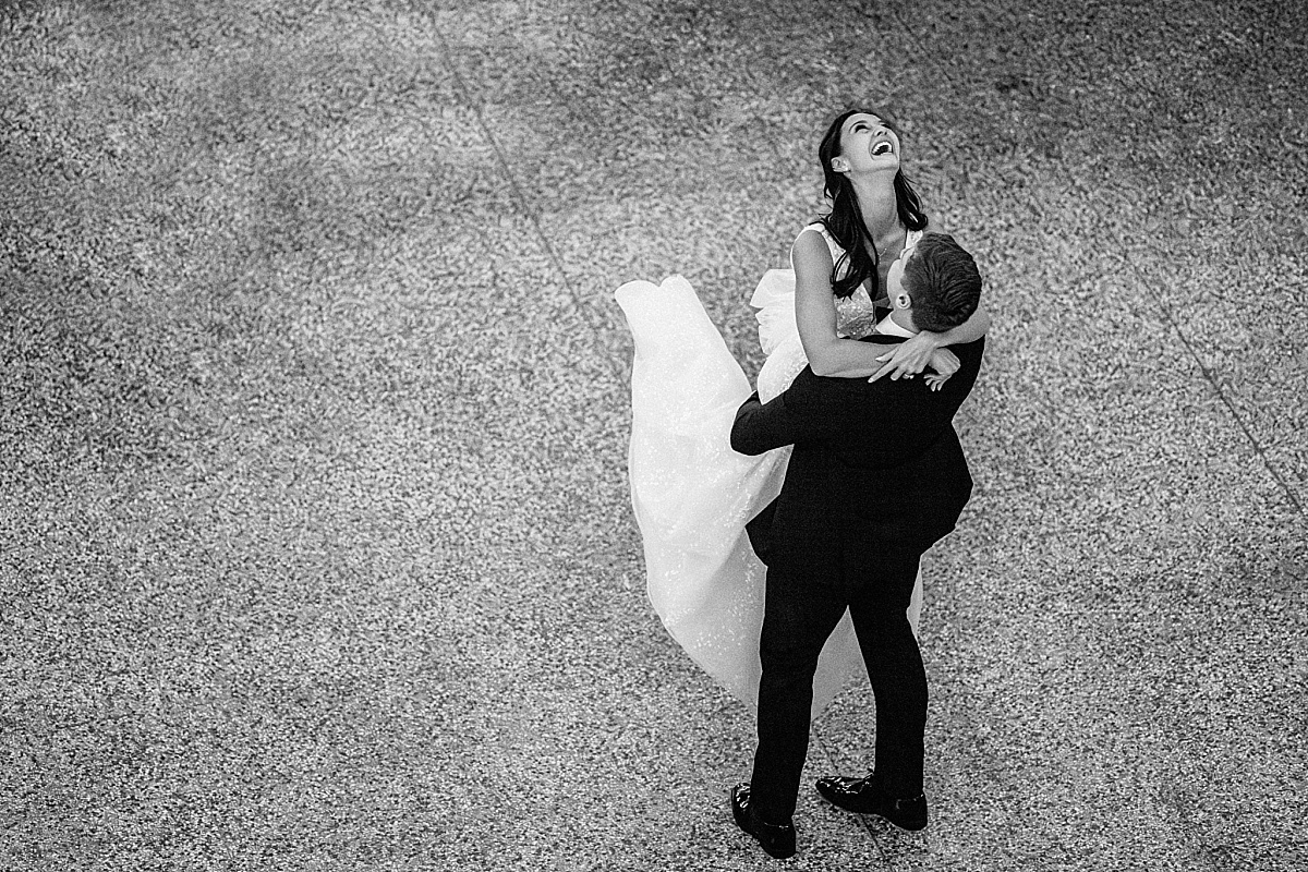 first dance with bride laughing in beautiful St. Louis Union Station wedding photo